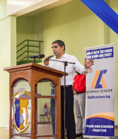Arawak Cement’s General Manager, Manuel Toro, addresses the students.